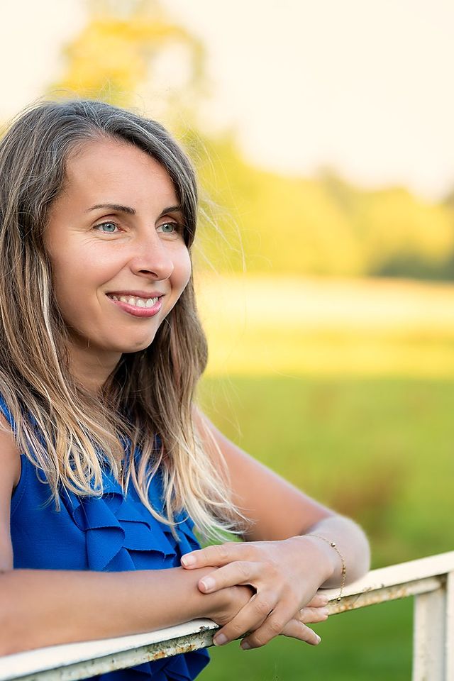 Woman photographed in warm evening light