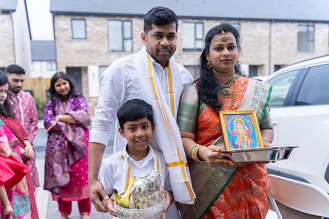 Family arriving for their Grihapravesham