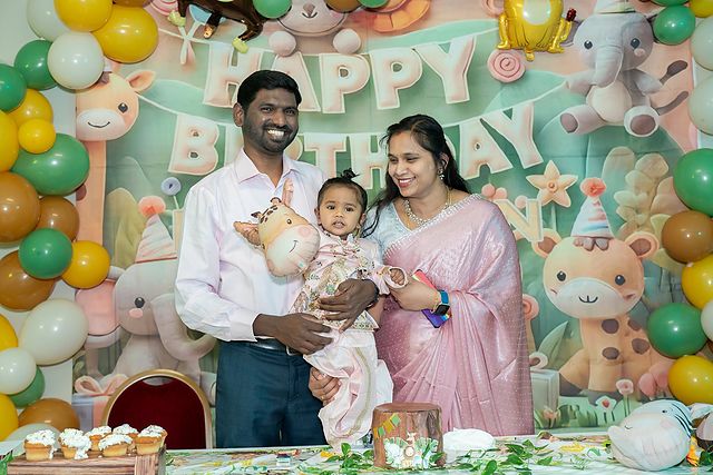 Parents with their baby at a first birthday