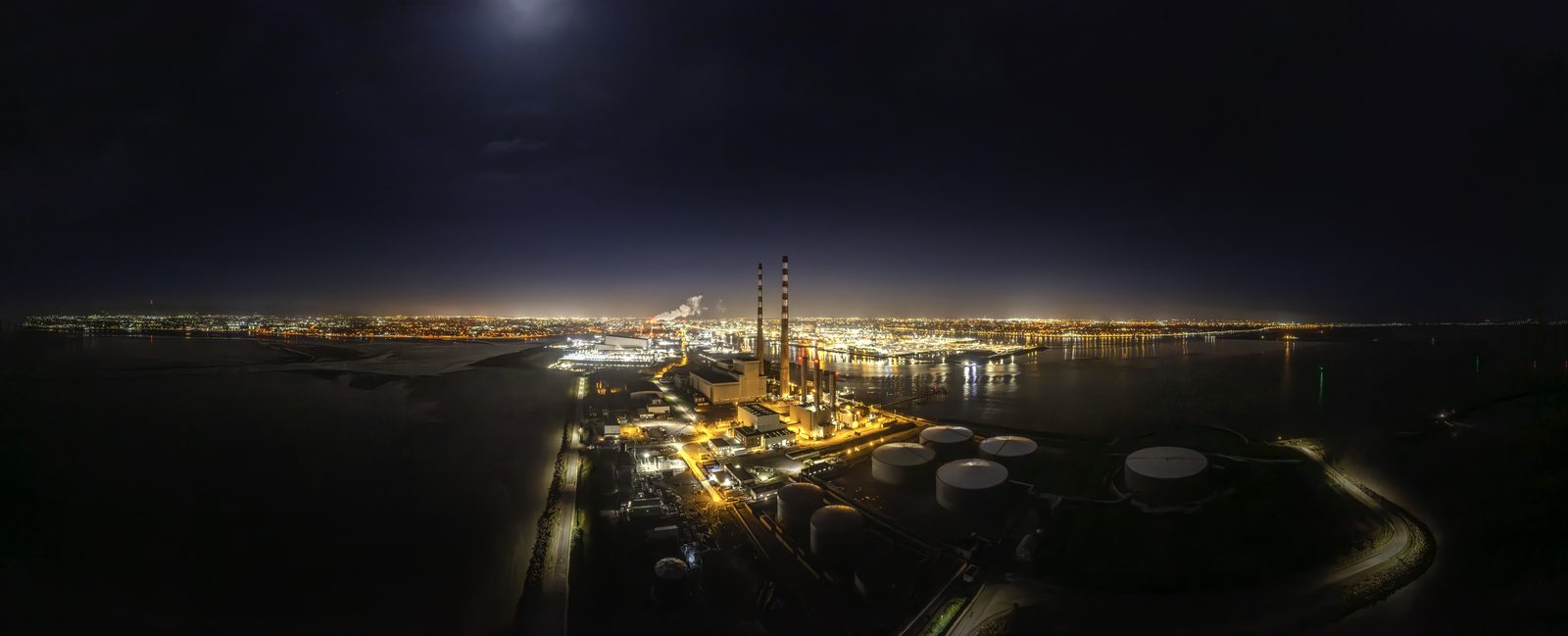 Poolbeg chimneys and Dublin Bay at night, from the air