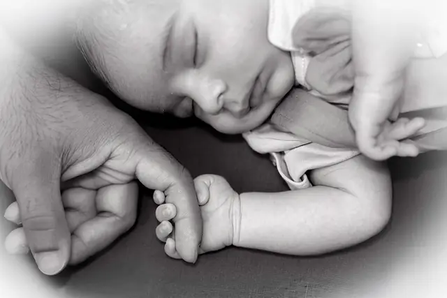 Black and white newborn close-up