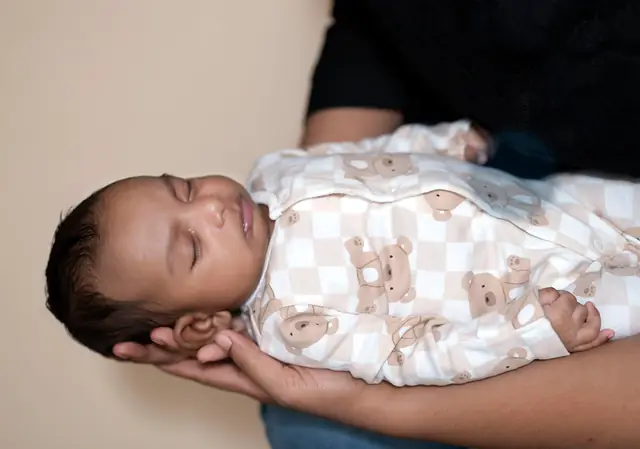 Newborn in mother's arms